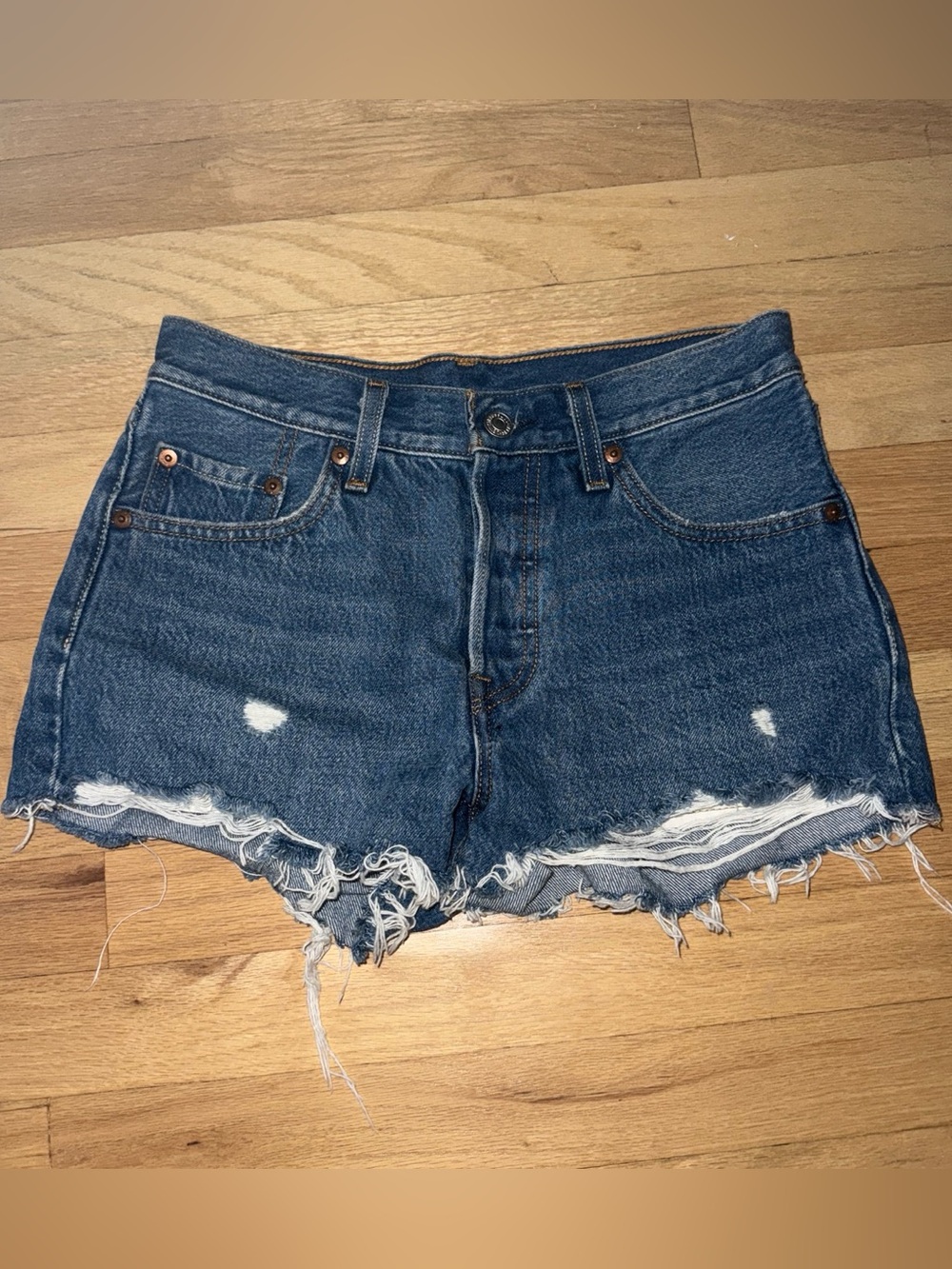 Levi's Distressed Denim Shorts in Mid Blue